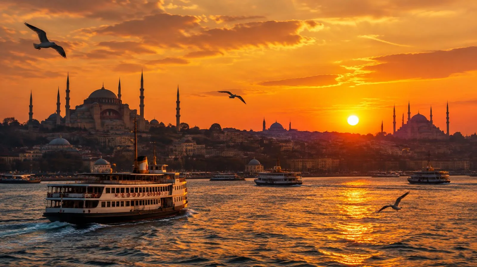 Istanbul skyline of domes and minarets over the Bosphorus at sunset